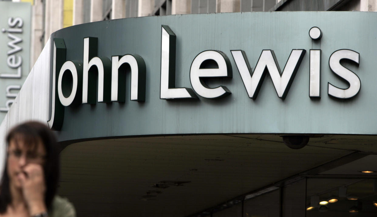 The John Lewis department store and sign on its Oxford Street flagship store in London, Wednesday Aug. 13, 2008. (AP Photo/Alastair Grant)