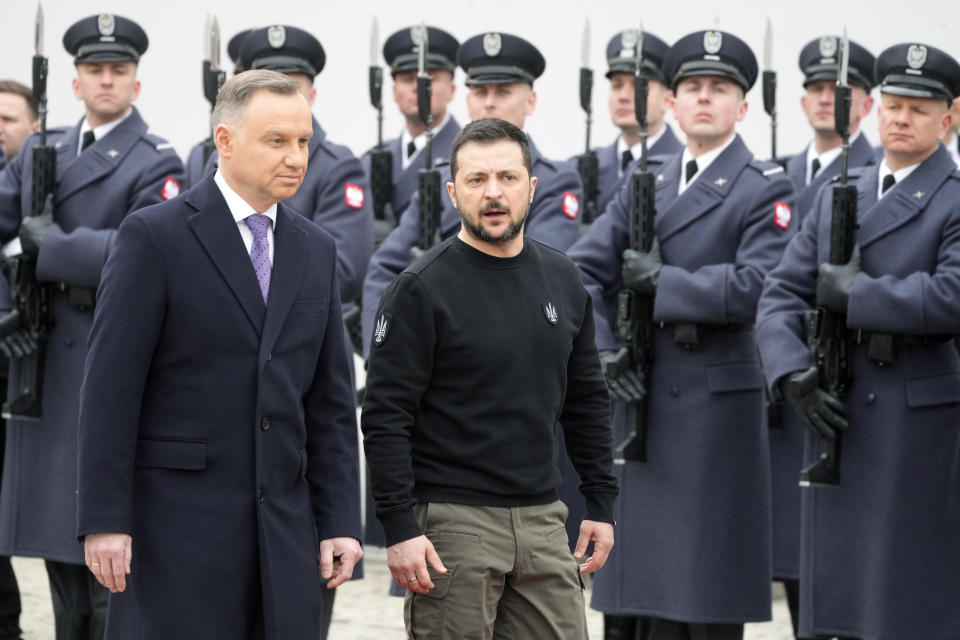 Poland's President Andrzej Duda, left, welcomes Ukrainian President Volodymyr Zelenskyy as they meet at the Presidential Palace in Warsaw, Poland, Wednesday, April 5, 2023. (AP Photo/Czarek Sokolowski)