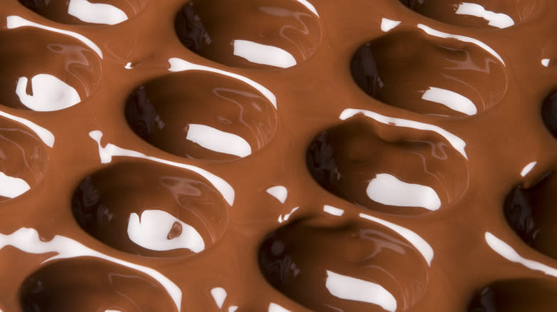 melted chocolate in chocolate mold 