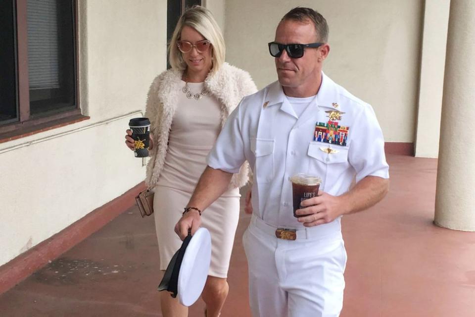 Navy Special Operations Chief Edward Gallagher, right, walks with his wife, Andrea Gallagher, left, as they arrive to military court in June. | Julie Watson/AP/Shutterstock