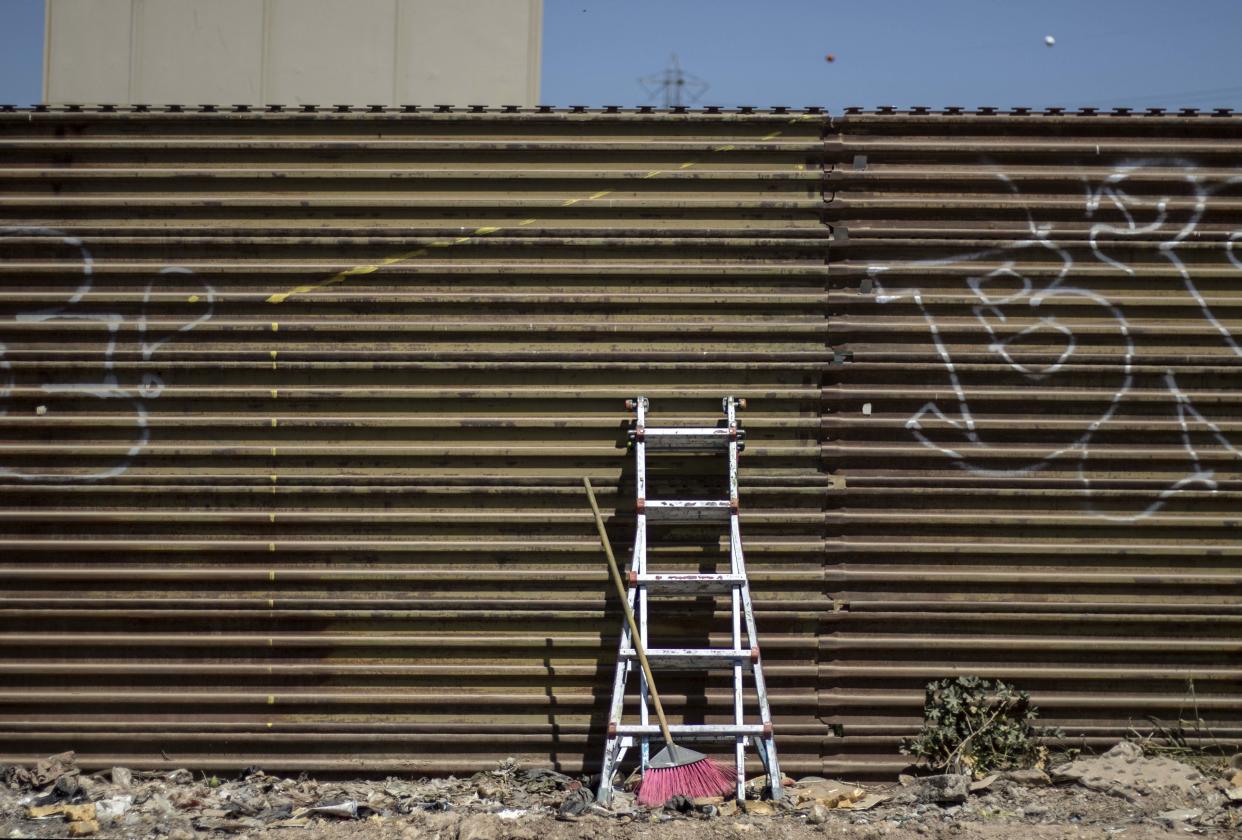 People opposed to President Trump’s proposed border wall started a fundraiser to buy ladders for immigrants. (Photo: Guillermo Arias/AFP/Getty Images)