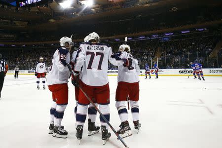 FILE PHOTO: Apr 5, 2019; New York, NY, USA; Columbus Blue Jackets left wing Artemi Panarin (9) celebrates his goal against the New York Rangers with teammates during the third period at Madison Square Garden. Mandatory Credit: Adam Hunger-USA TODAY Sports