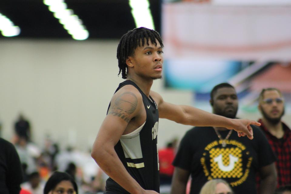 DJ Wagner of the NJ Scholars points down the court during an AAU basketball game Monday, May 30, 2022, at the Kentucky Exposition Center in Louisville, Ky. Wagner is one of the top recruits in the 2023 class and has scholarship offers from Louisville and Kentucky.