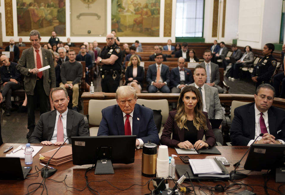 Former President Donald Trump sits in the courtroom with his legal team before the continuation of his civil business fraud trial at New York Supreme Court, Tuesday, Oct. 17, 2023, in New York. (AP Photo/Seth Wenig, Pool)