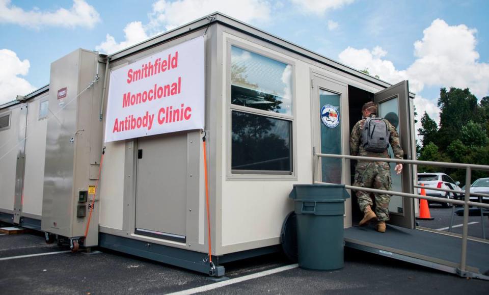 National Guard member Charles Eldridge enters a monoclonal antibody treatment clinic for people who are COVID-19 positive, located in the parking lot of the Johnston County Public Health Department in Smithfield, N.C. on Wednesday, Sept. 15, 2021.