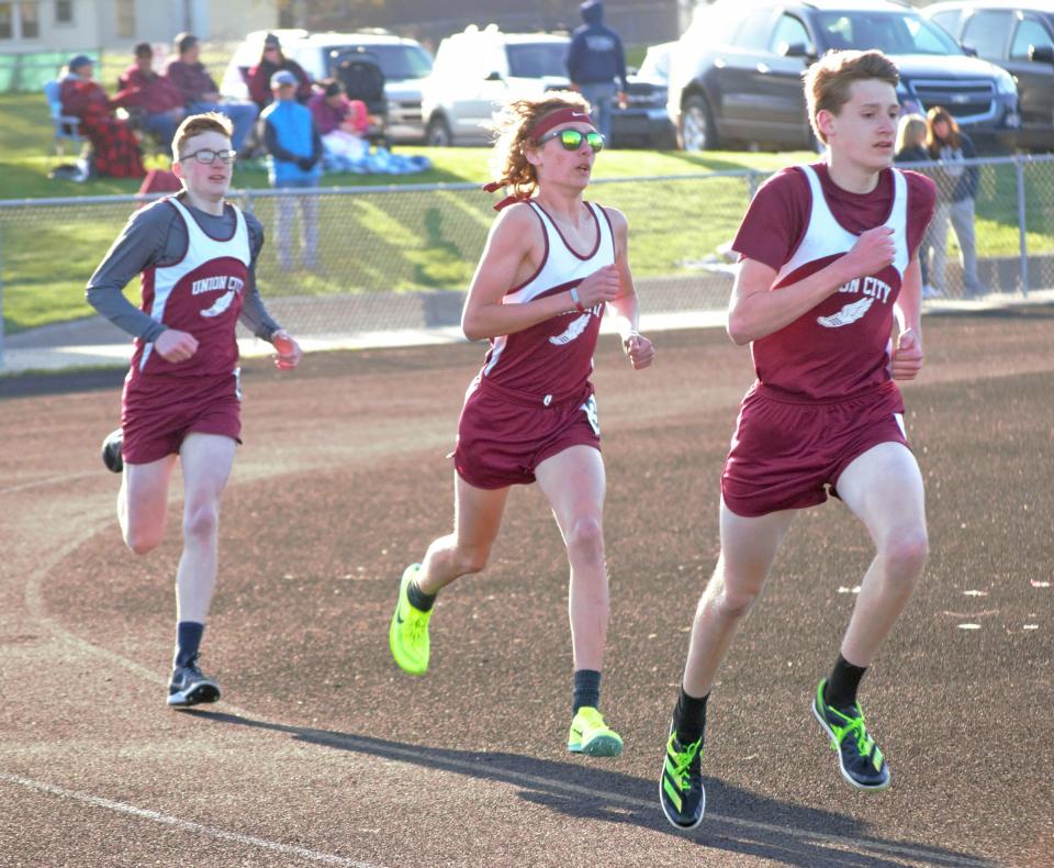 Union City's Cohen Burdick, Ben Gautsche, and Malachi Payne run together in a pack during the 800 meter run on Wednesday. The Charger trio finished 1-2-3 in the race