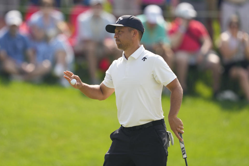 Xander Schauffele celebrates after a birdie on the 18th hole during the first round of the PGA Championship golf tournament at the Valhalla Golf Club, Thursday, May 16, 2024, in Louisville, Ky. (AP Photo/Matt York)