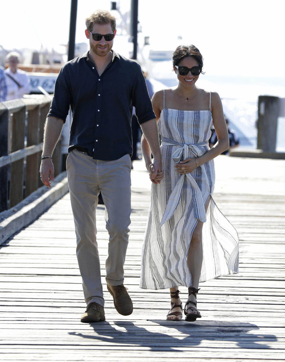 The Duchess of Sussex wearing a Reformation striped dress on Fraser Island in 2018 