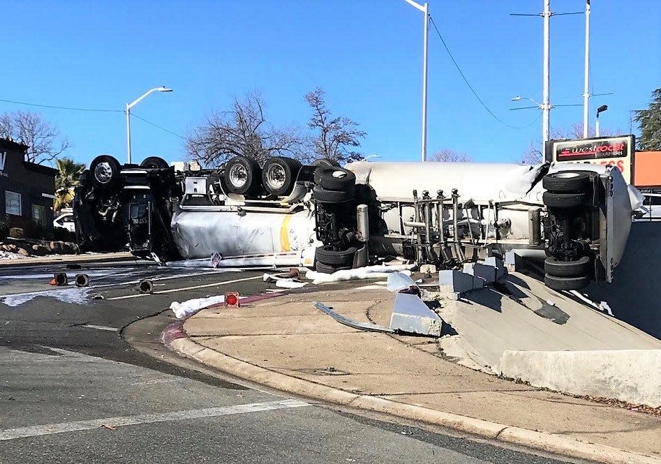 A tanker truck overturned at Pine and East streets early Friday morning, Jan. 21, 2022, and spilled fuel, causing the closure of several downtown streets. An undetermined amount of a gasoline-and-diesel mix entered a storm drain, which contaminated a stretch of the Anderson-Cottonwood Irrigation District canal and Calaboose Creek leading to the Sacramento River.