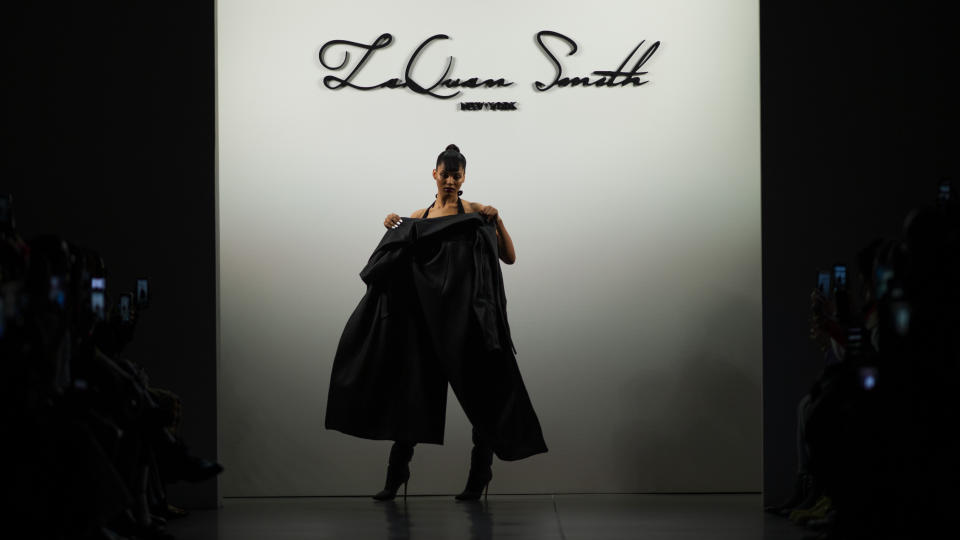 The LaQuan Smith collection is modeled during Fashion Week, Saturday, Feb. 8, 2020, in New York. (AP Photo/Eduardo Munoz Alvarez)