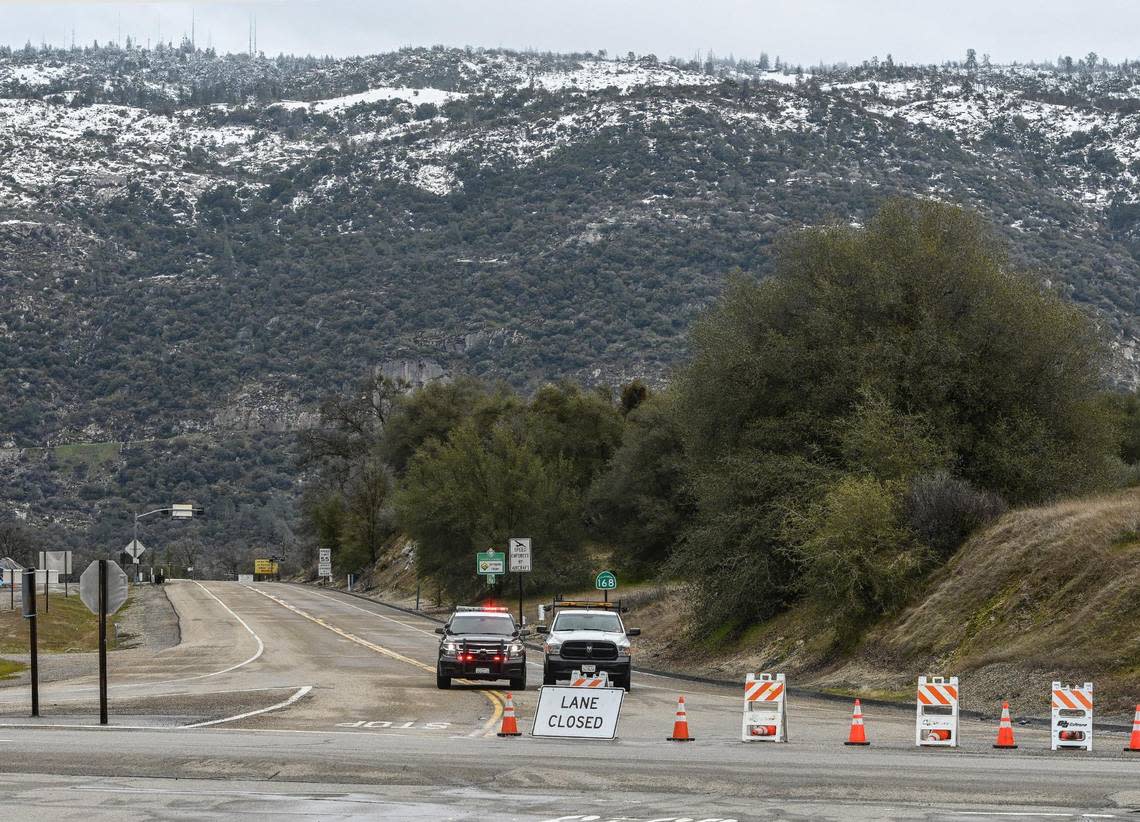 Snow covers the foothills east of Auberry as Caltrans and CHP have the road closed at Highway 168 and Lodge Road at the bottom of the four lane following heavy snow along the foothills route to Shaver Lake on Monday, Feb. 27, 2023.