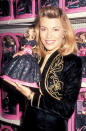 <p>What a doll! White celebrates a fashion doll in her likeness at Lionel Kiddee City in New York City in 1992. </p>