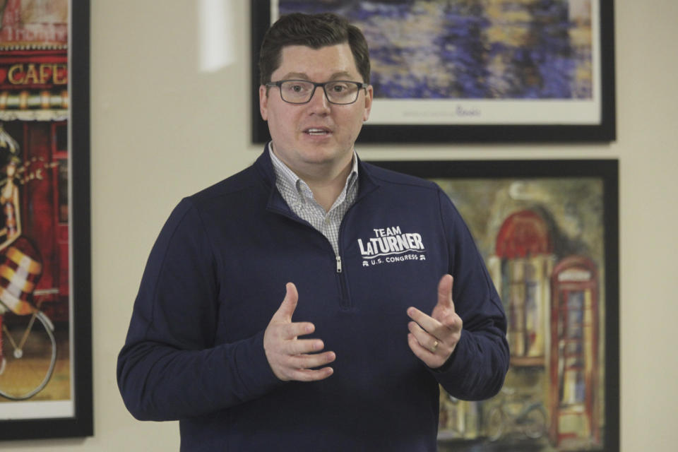 FILE - U.S. Rep. Jake LaTurner, R-Kan., speaks to Republican volunteers during a campaign stop with other GOP candidates, Nov. 7. 2022, at a restaurant in Topeka, Kan. A criminal trial is set to start Tuesday, Jan. 17, 2023, for a northeastern Kansas man who federal prosecutors say developed a fixation on LaTurner and threatened to kill him, at a time when authorities have seen a sharp increase in threats to the nation's lawmakers and their families. (AP Photo/John Hanna, File)