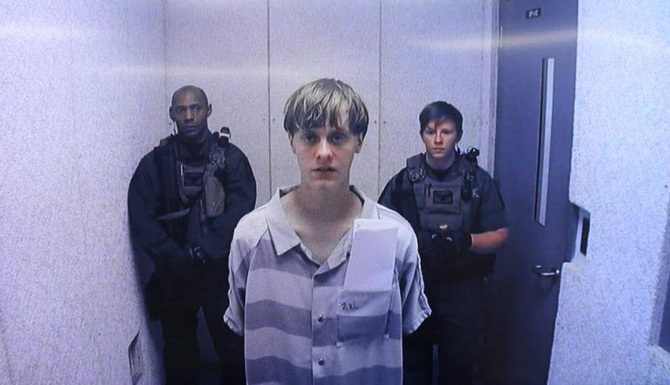 Dylann Roof, who killed nine worshippers at a Black church in South Carolina in 2015, was convicted of 33 charges, including hate crimes. <a href="https://www.gettyimages.com/detail/news-photo/in-this-image-from-the-video-uplink-from-the-detention-news-photo/477782304?adppopup=true" rel="nofollow noopener" target="_blank" data-ylk="slk:Grace Beahm-Pool/Getty Images;elm:context_link;itc:0;sec:content-canvas" class="link ">Grace Beahm-Pool/Getty Images</a>