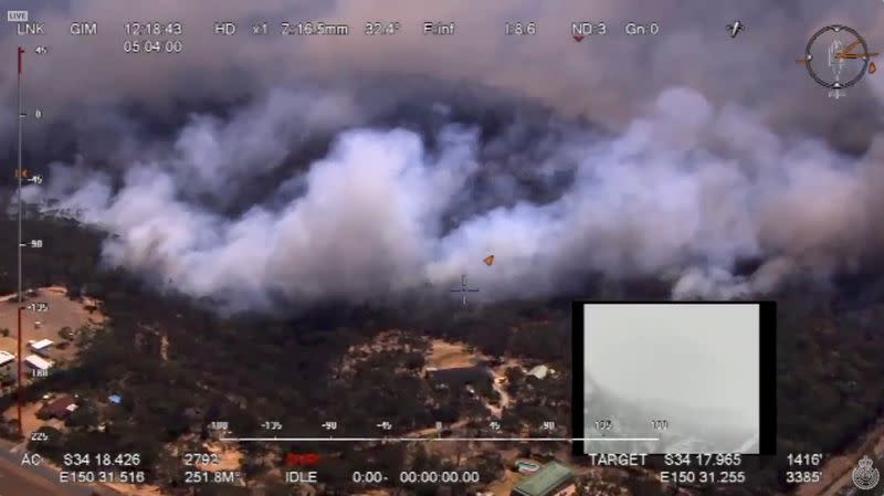 Aerial view shows the Green Wattle Creek fire crossed the railway line near Balmoral, in Wollondilly, New South Wales