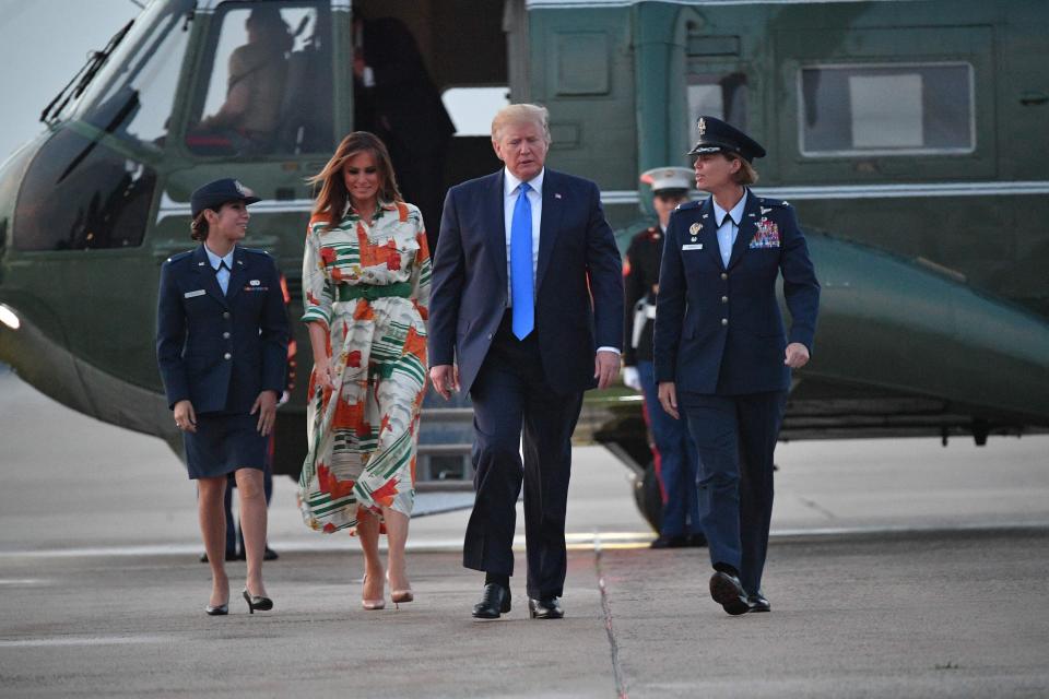 US President Donald Trump and First Lady Melania Trump stepped off Marine One and make their way to board Air Force One before departing from Andrews Air Force Base in Maryland on June 2, 2019. - US President Donald Trump is flying to England for a three-day state visit. (Photo by MANDEL NGAN / AFP)        (Photo credit should read MANDEL NGAN/AFP/Getty Images)