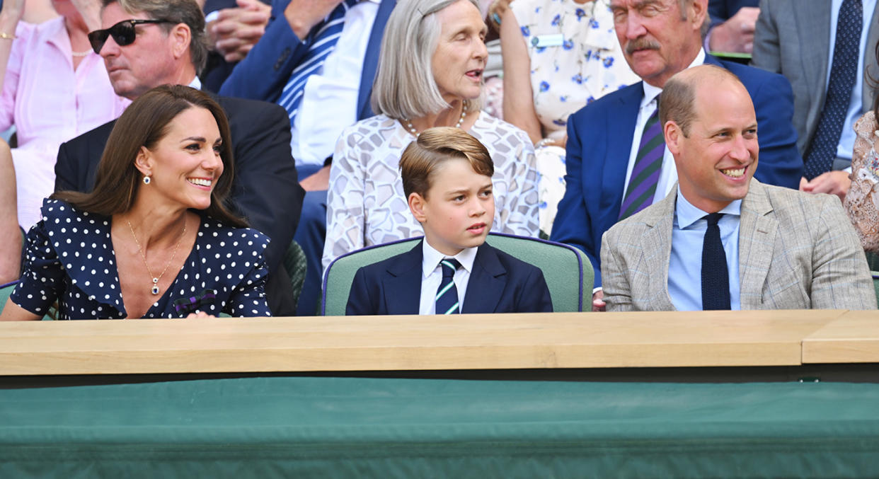 Prince George looked smart in a suit and tie as he sat between his parents in the Royal Box at Wimbledon. (Getty Images)