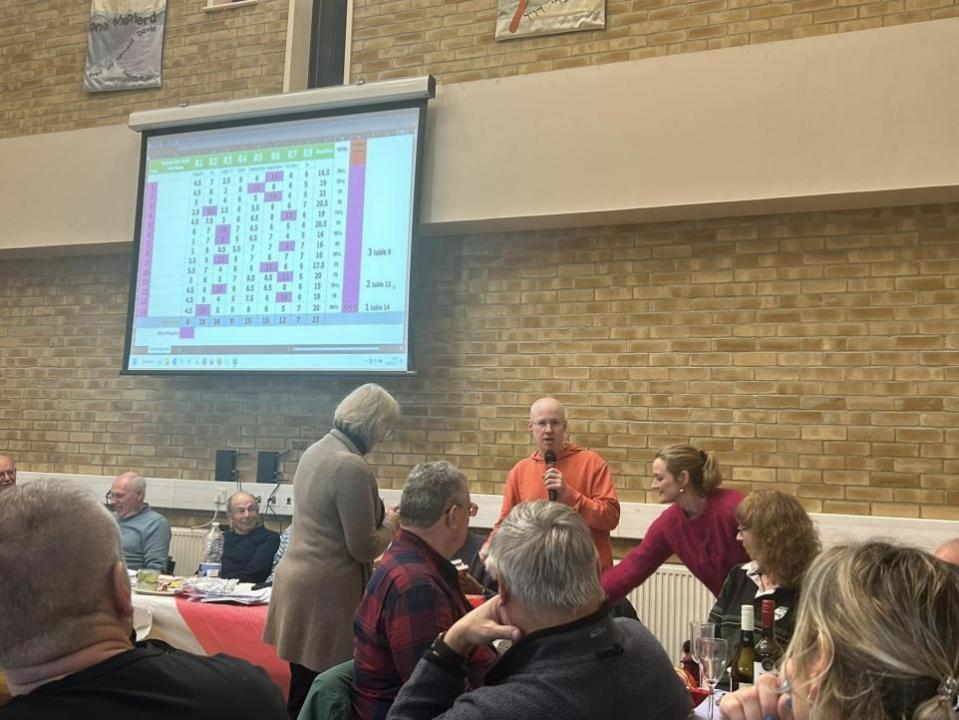 Watford Observer: Matt Lucas (centre) was the quiz master for the evening. 