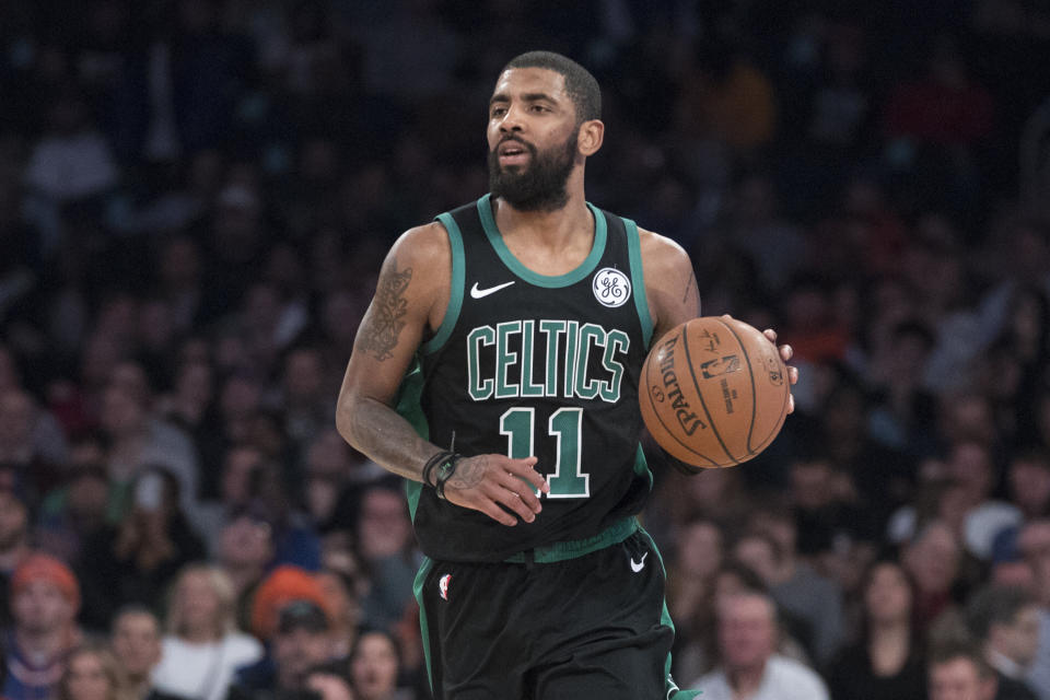 Boston Celtics guard Kyrie Irving handles the ball during the second half of an NBA basketball game against the New York Knicks, Friday, Feb. 1, 2019, at Madison Square Garden in New York. The Celtics won 113-99. (AP Photo/Mary Altaffer)