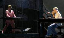 FILE - This Feb. 21, 2001 file photo shows Elton John, left, and Eminem performing together at the 43rd annual Grammy Awards in Los Angeles. The two were paired together by long-time Grammys producer Ken Ehrlich, who hangs up his producer hat on Sunday. (AP Photo/Kevork Djansezian, File)