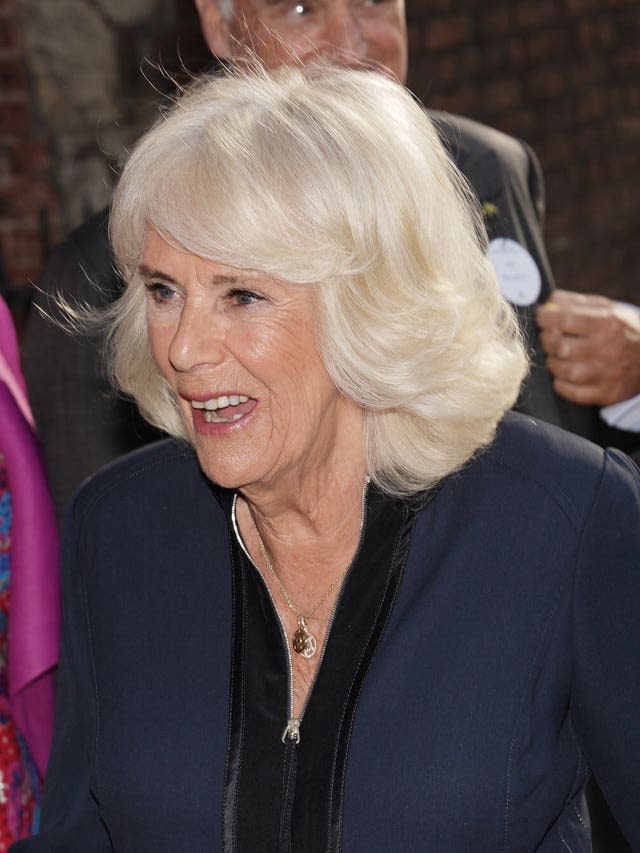 Queen Camilla arrives for a reception with authors, actors and lovers of literature attending the the Queen’s Reading Room Literary Festival at Hampton Court Palace. 