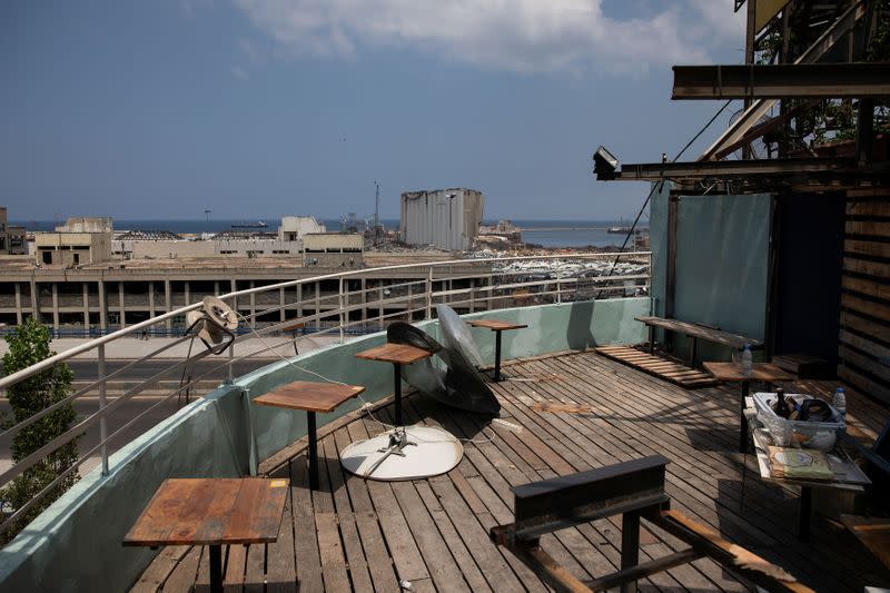 A view of the port area is seen from the damaged "Coup d'Etat" bar, in the aftermath of a massive explosion at the port , in Beirut