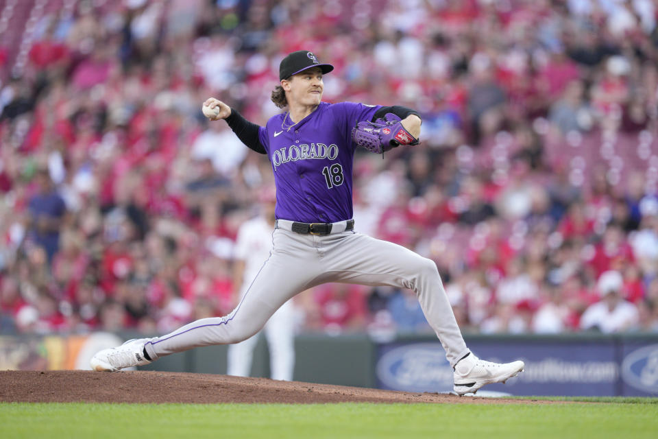 Colorado Rockies pitcher Ryan Feltner throws during the first inning of a baseball game against the Cincinnati Reds, Monday, July 8, 2024, in Cincinnati. (AP Photo/Jeff Dean)