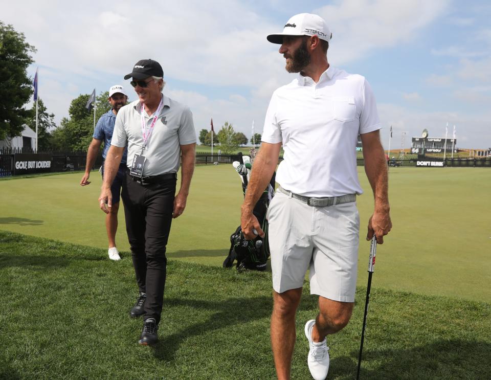 Dustin Johnson (right) remains the highest-ranked player in the world on the LIV Golf Series, at 21st this week. Johnson fell out of the top-20 in the world for the first time in seven years. On the left is LIV Golf CEO Greg Norman.