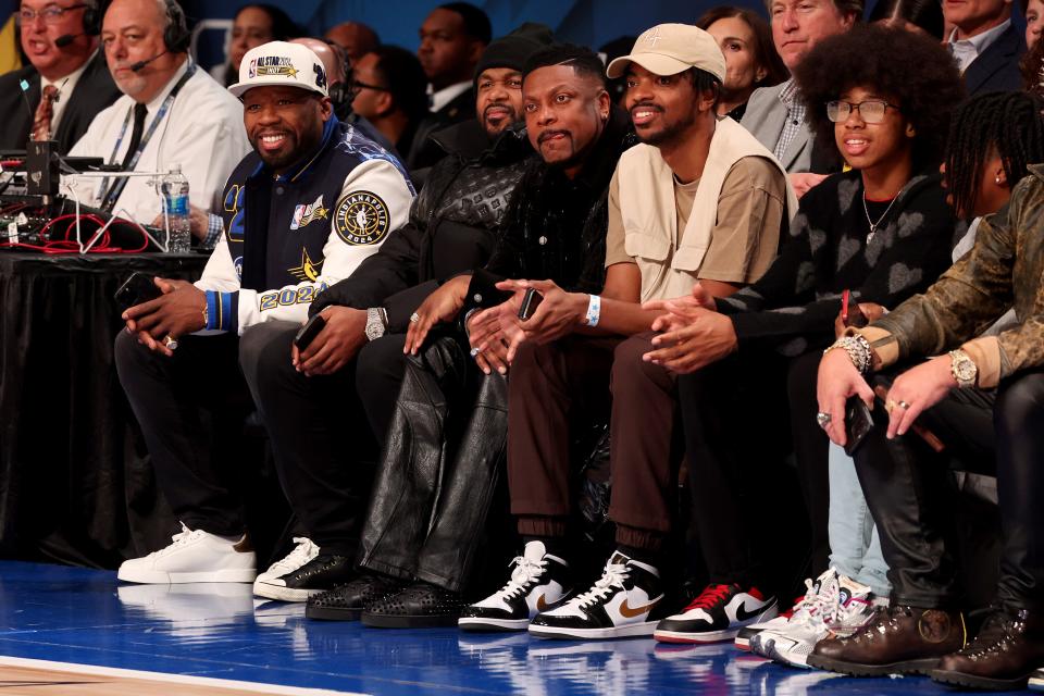 50 Cent, Anthony Wilson, Chris Tucker, Destin Christopher Tucker, and David Daniel Otunga Jr. sit courtside during the 73rd NBA All-Star Game at Gainbridge Fieldhouse on February 18, 2024 in Indianapolis, Indiana.