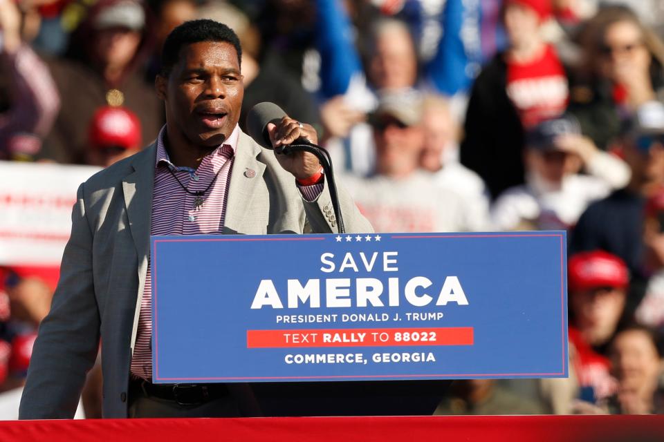 Republican Senate candidate Herschel Walker speaks at a "Save America Rally" at the Banks County Dragway on Saturday, March 26, 2022.