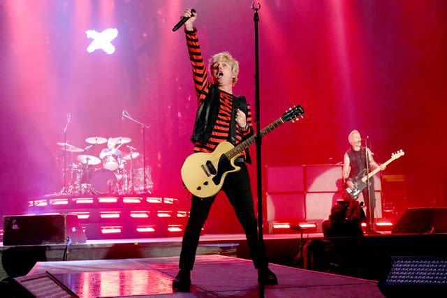 <p>Daniel Boczarski/Getty for Harley-Davidson</p> Billie Joe Armstrong, and Mike Dirnt of Green Day perform onstage during the Harley-Davidson's Homecoming Festival