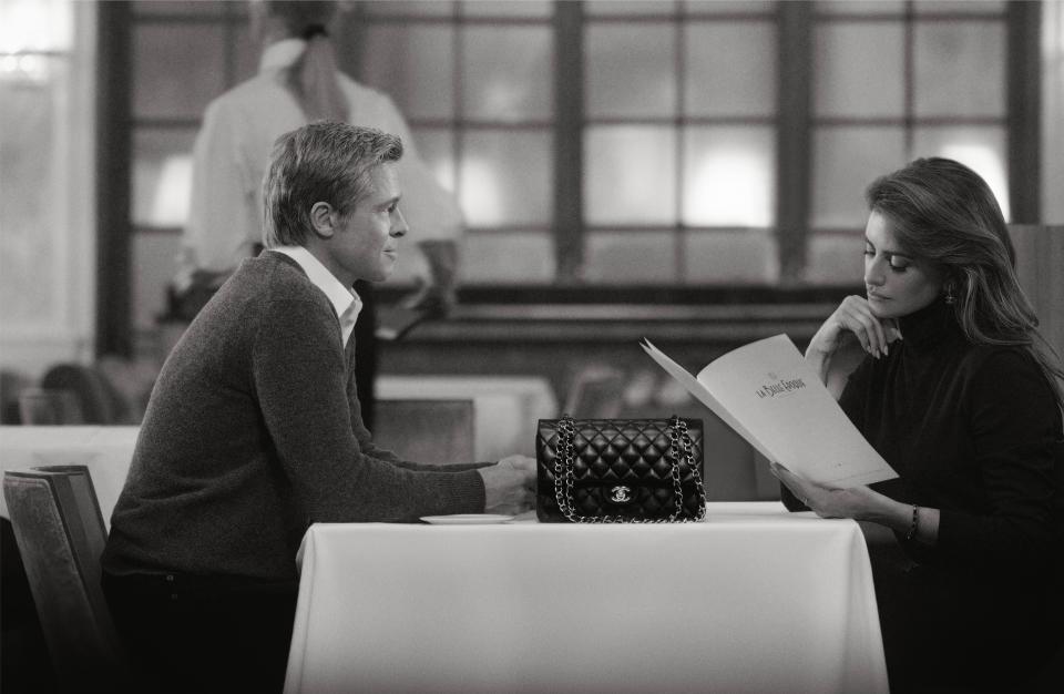 Brad Pitt and Penélope Cruz in Chanel's handbag ad campaign.