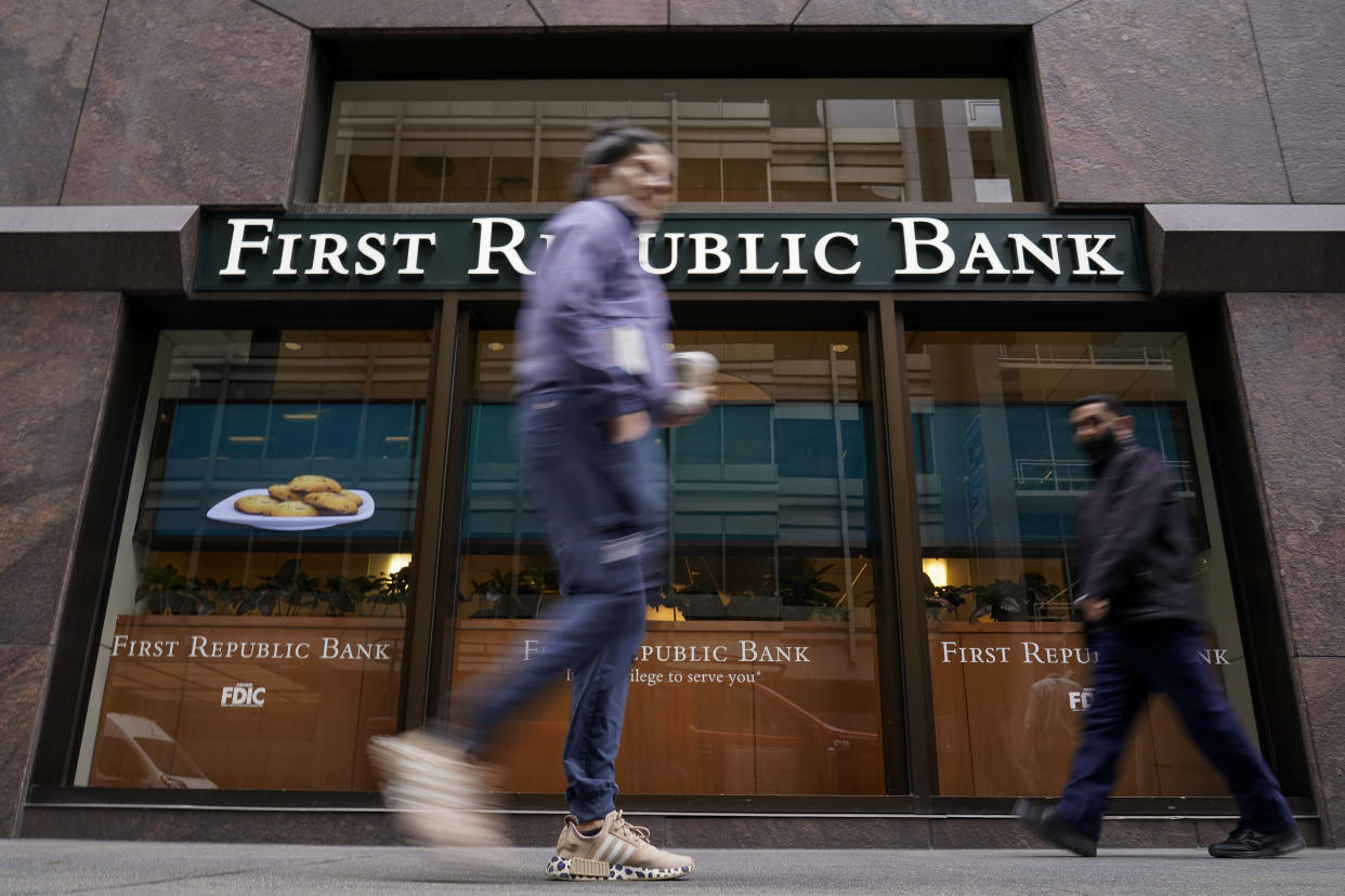 Pedestrians walk past the headquarters of First Republic Bank in San Francisco, Monday, May 1, 2023. Regulators seized the troubled bank early Monday, making it the second-largest bank failure in U.S. history, and promptly sold all of its deposits and most of its assets to JPMorgan Chase Bank in a bid to head off further banking turmoil in the U.S. (AP Photo/Godofredo A. Vásquez)