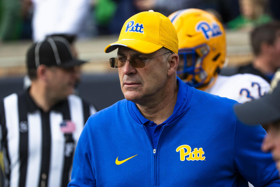 Pittsburgh head coach Pat Narduzzi runs on to the field before an NCAA college football game against Notre Dame Saturday, Oct. 28, 2023, in South Bend, Ind. (AP Photo/Michael Caterina)