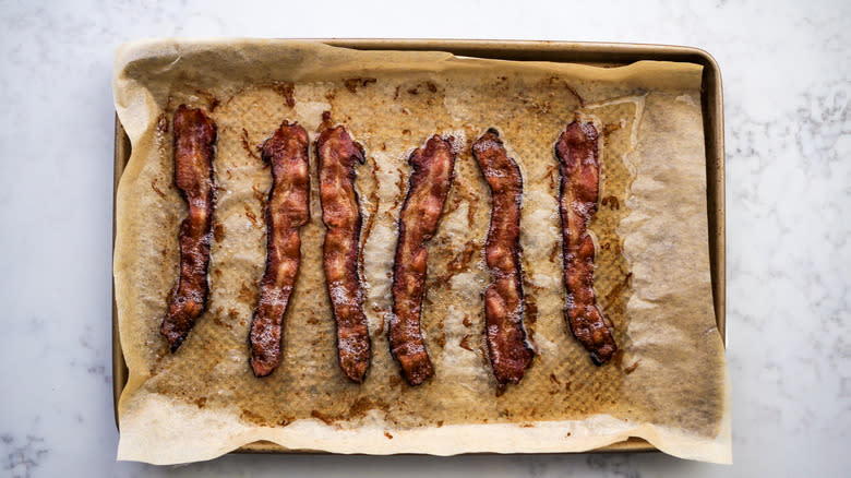 cooked bacon on baking tray
