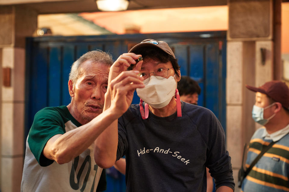 Oh Young-soo and Hwang on the Squid Game set. - Credit: Noh Juhan/Netflix