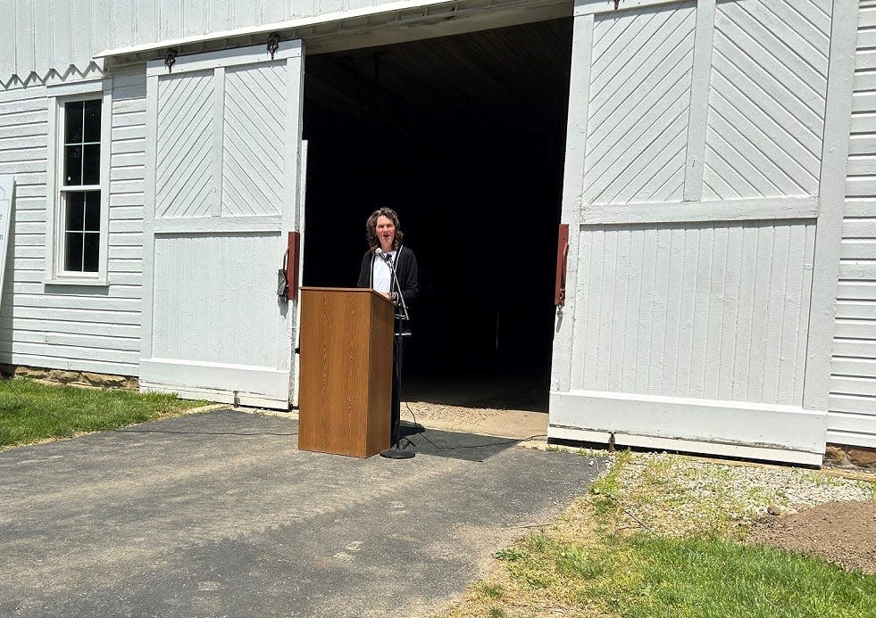 Granville Mayor Melissa Hartfield speaks during a groundbreaking ceremony May 1 for a $1.5 million renovation of the historic barn at the Bryn Du Mansion. The renovation will transform the barn's first floor into a home for the Licking County Community Center.