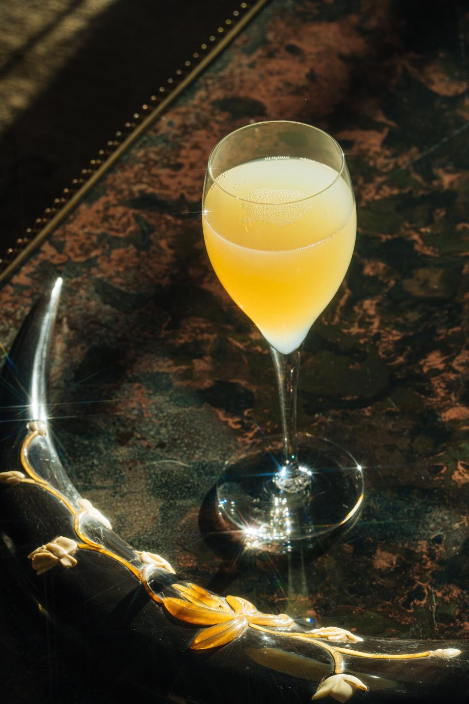 Author Ernest Hemingway's prescription for his "Death in the Afternoon" Absinthe-based creation: Drink three to five slowly. This and other effervescent cocktails offer a bubbly start to the new year.