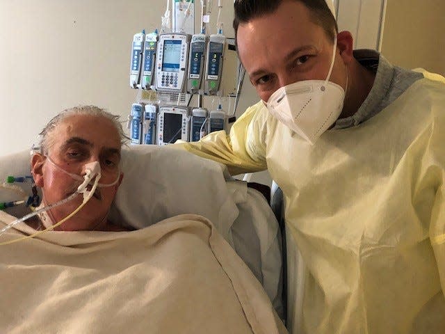 Dave Bennett Sr., left, and David Bennett Jr., right, are photographed on Jan. 12, 2022. Dave Bennett, 57, agreed to be the first to risk experimental surgery, the first time a gene-edited pig has been used as an organ donor.