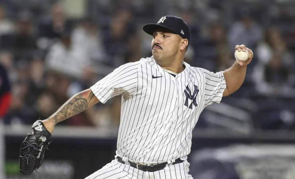 New York Yankees starting pitcher Nestor Cortes (65) pitches in the first inning against the Boston Red Sox at Yankee Stadium.