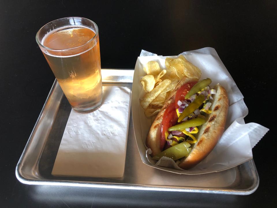 The Chi-Town Dog at the Quarter Up Bar & Arcade in Akron is paired with R. Shea Brewery's raspberry light lager.
