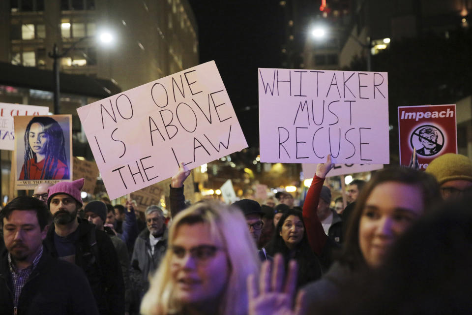 Protesters march from Cal Anderson Park to the Federal Building downtown in Seattle, in support of special counsel Robert Mueller and against President Donald Trump's appointment this week of acting Attorney General Matthew Whitaker, Thursday, Nov. 8, 2018. Protesters nationwide have called for the protection of special counsel Mueller's investigation into potential coordination between Russia and President Donald Trump's campaign. (Genna Martin/seattlepi.com via AP)