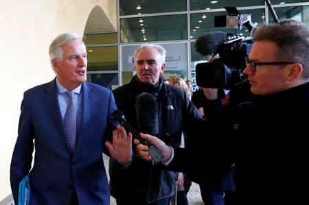 EU's Chief Brexit Negotiator Michel Barnier leaves the EU Commission after a meeting with Britain's Brexit Secretary Stephen Barclay in Brussels