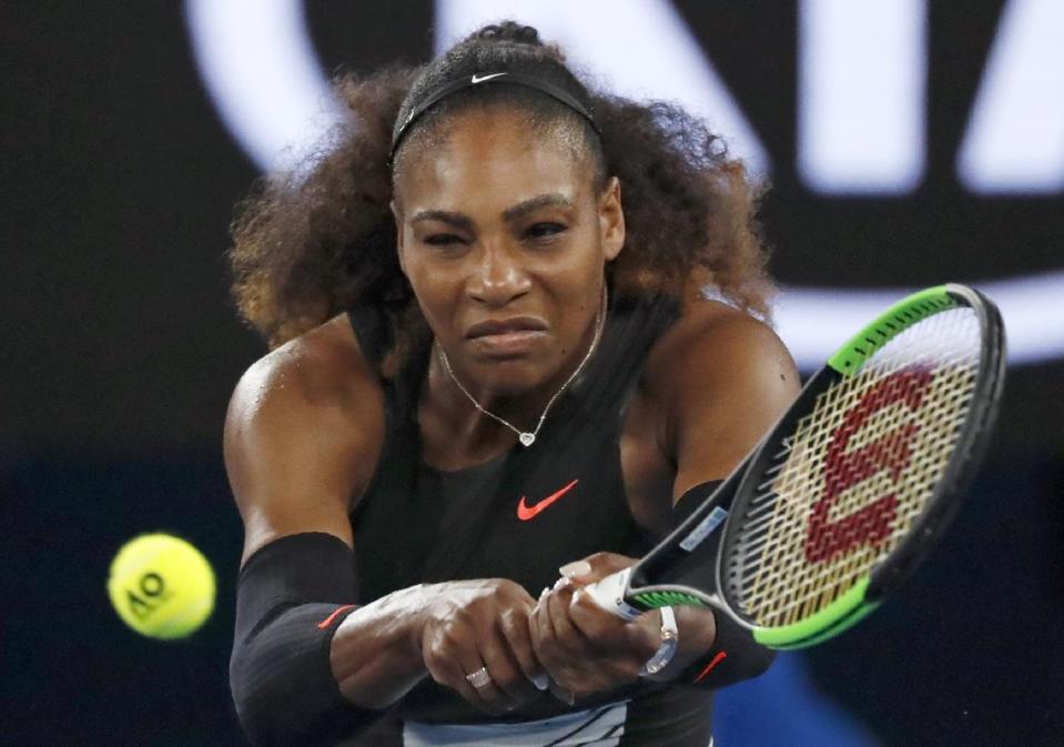 United States' Serena Williams makes a backhand return to Lucie Safarova of the Czech Republic during their second round match at the Australian Open tennis championships in Melbourne, Australia, Thursday, Jan. 19, 2017. (AP Photo/Kin Cheung)