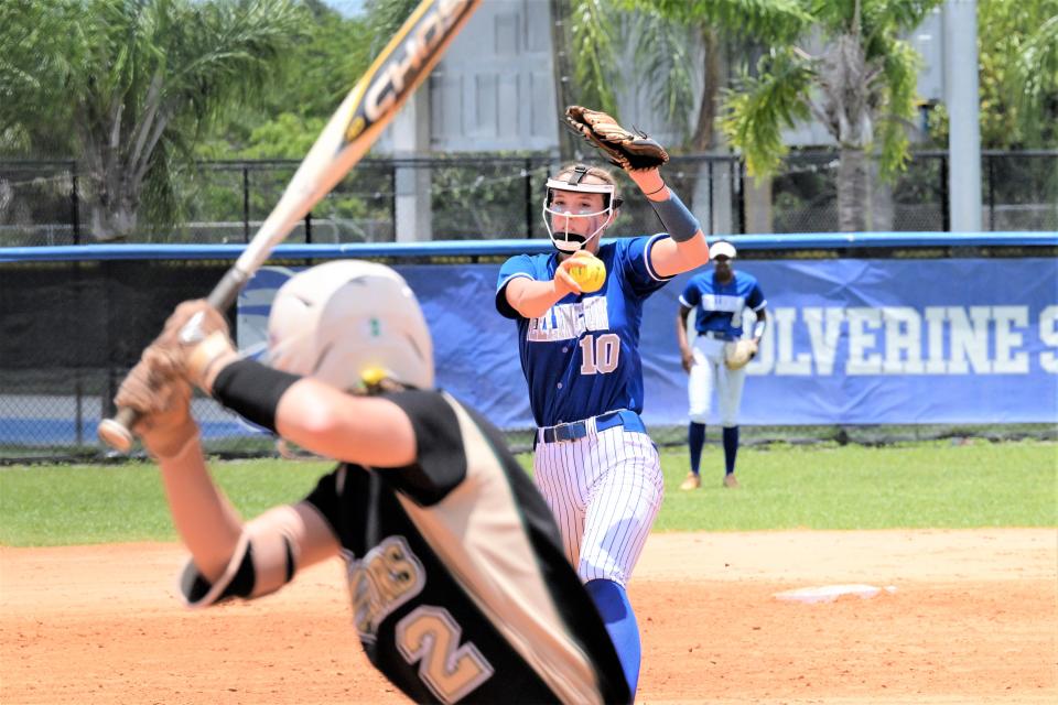 Wellington's Jordan White fires a pitch against Jupiter's Emma Lucchesi during the fifth inning of Saturday's regional final (May 20, 2023).