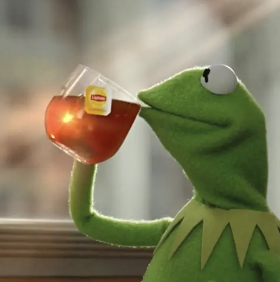 Kermit the Frog sipping tea from a glass cup