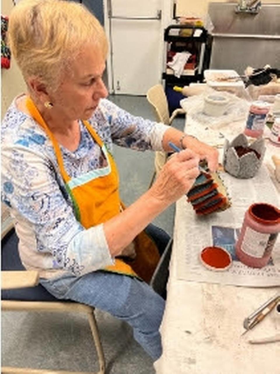 Ana Maria Gonzalez started teaching ceramics two years ago at East Ridge at Cutler Bay retirement community where she lives. Her students recently had a gallery showing at Cauley Square. East Ridge at Cutler Bay