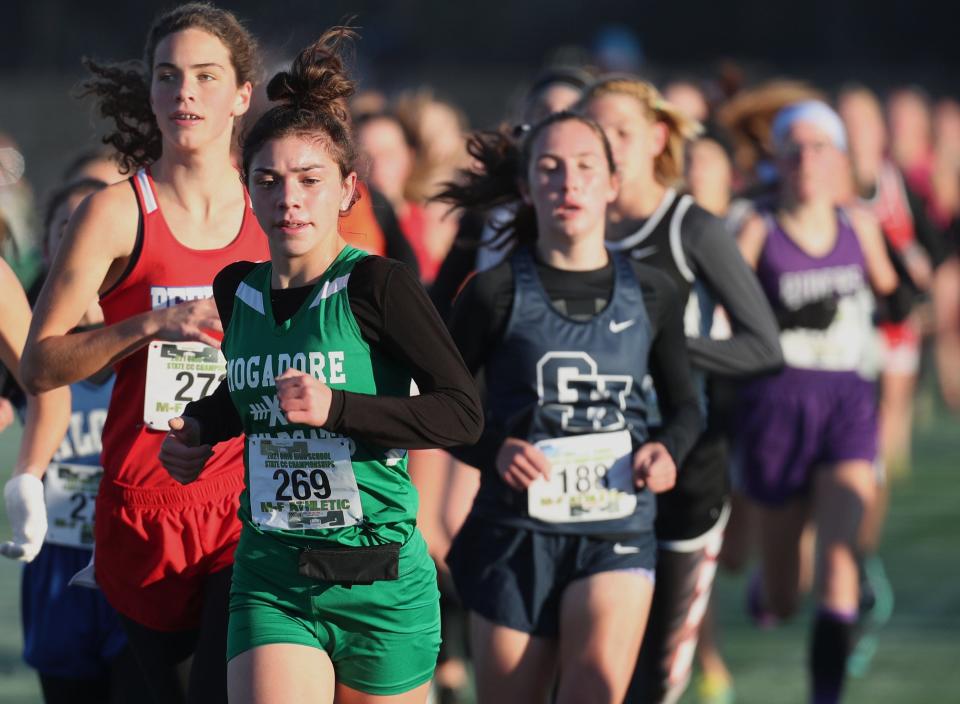 Mogadore Katie Lane runs in the Div. III Girls Cross Country Championship at Fortress Obetz and Memorial Park in Obetz.  [Mike Cardew/Akron Beacon Journal] Photo taken Saturday. Nov. 6 2021. 