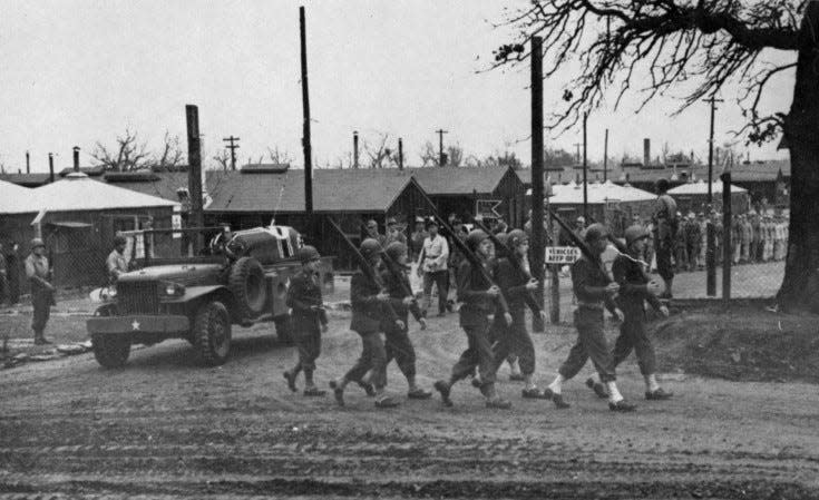 A funeral procession for an Afrika Korpsman at Camp Chaffee.