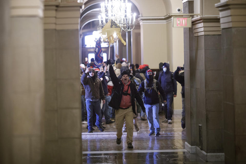 Demonstrators breaches barricades to enter the U.S. Capitol during a protest at the Ellipse. The House and Senate will meet in a joint session today to count the Electoral College votes to confirm President-elect Joe Biden's victory, but not before a sizable group of Republican lawmakers object to the counting of several states' electors. (Ting Shen/Bloomberg via Getty Images)